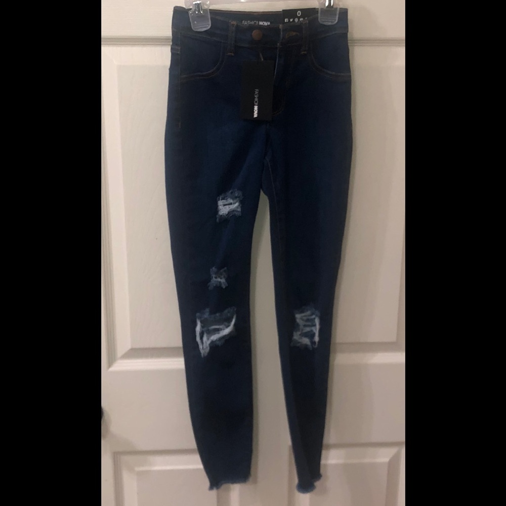 Dark blue denim ripped jeans